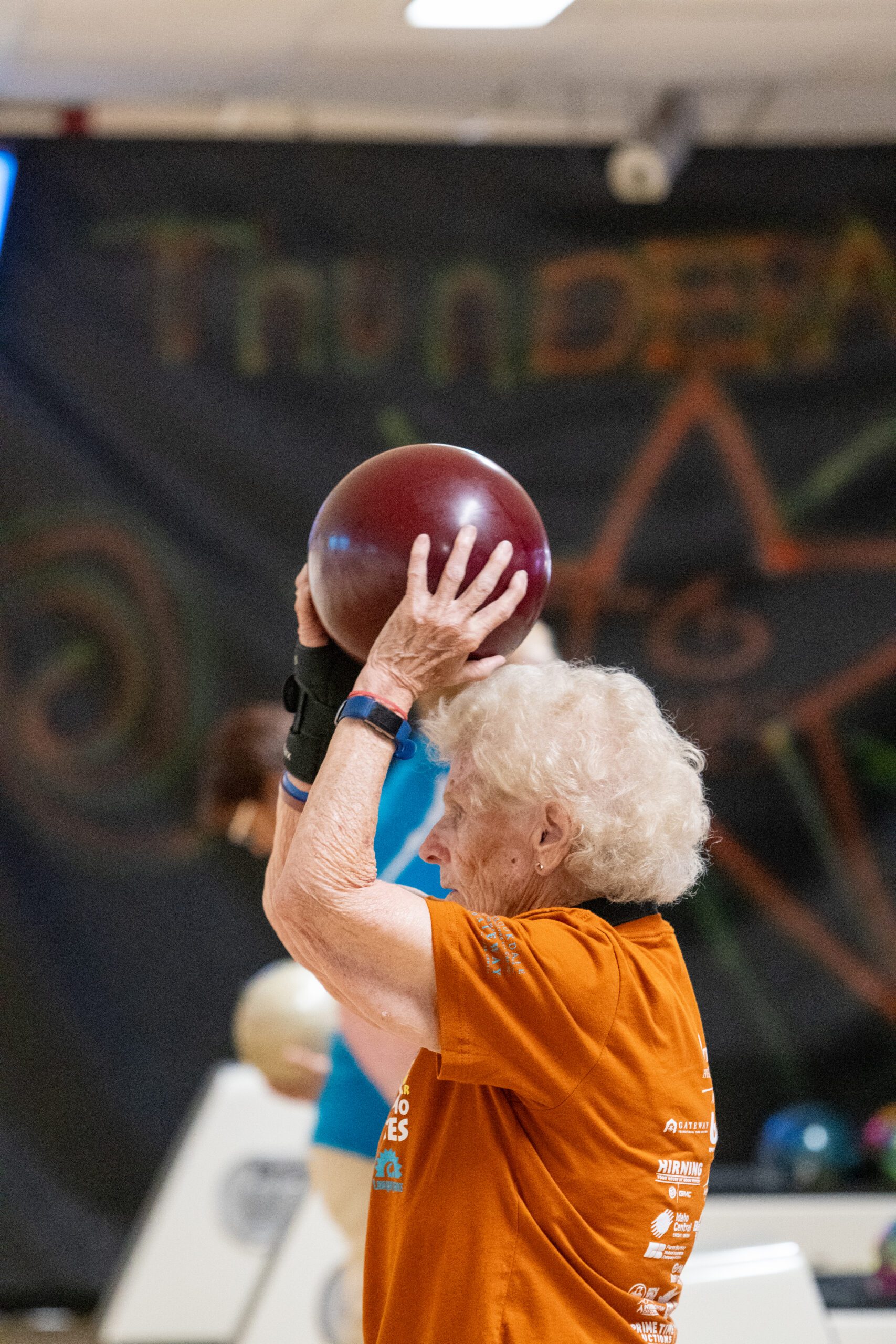 A purple background with the words southeast idaho senior games written in green.